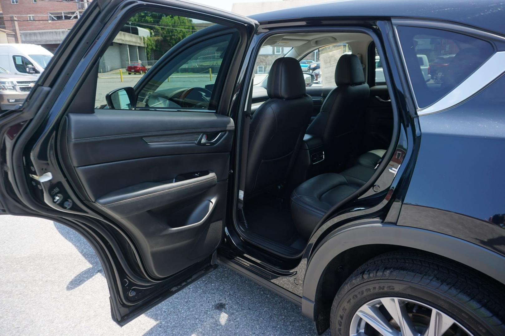 2021 BLACK /BLACK MAZDA CX-5 GRAND TOURING (JM3KFBDM1M1) with an 2.5L I4 engine, AUTOMATIC transmission, located at 312 Centre Ave, Schuylkill Haven, PA, 17972, (570) 593-5278, 40.638130, -76.177383- Photo#31